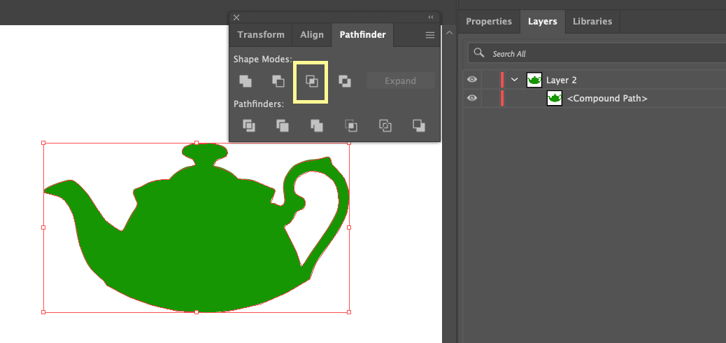 A green teapot with a green handle